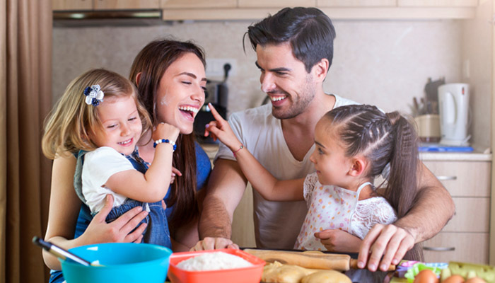 Family in the kitchen cooking